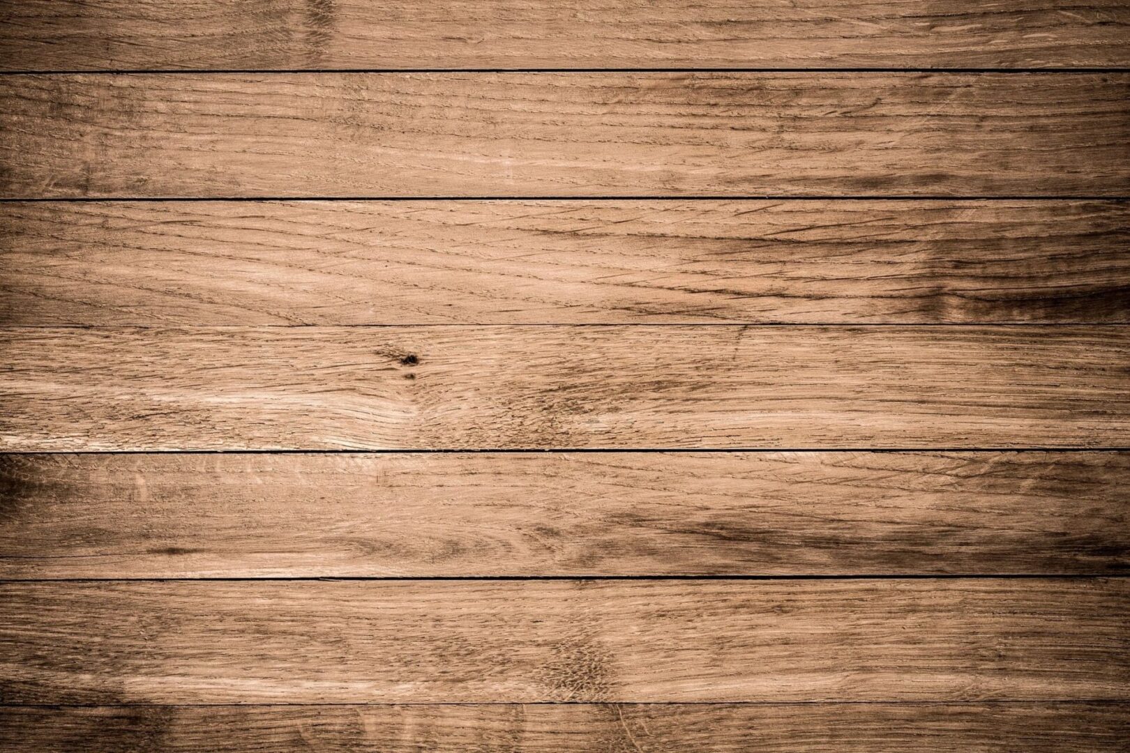 A close up of the wood grain on a wall