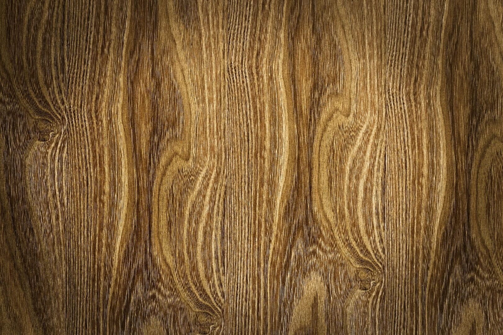 A close up of the wood grain on a surface